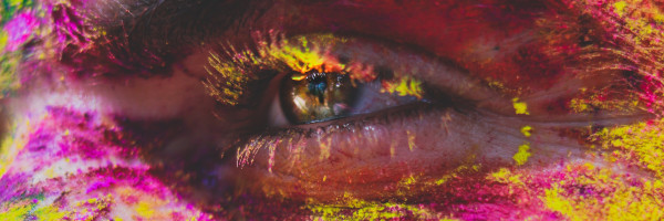 Eye with colourful face powder
